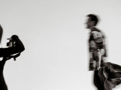 Abstract motion blur of someone walking fast outdoors